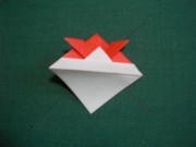 折り紙織り方写真/金魚No.[24] <br />奥に山折りします。